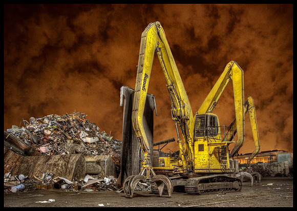 Scrap Yard Crane With an Orange Sky - Chicago